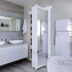 White full-length mirror cabinet door opens in a bathroom, revealing hidden storage shelves behind it.