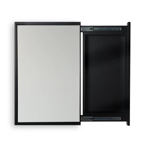 Framed wall mirror slides open to reveal a concealed black safe compartment behind it.